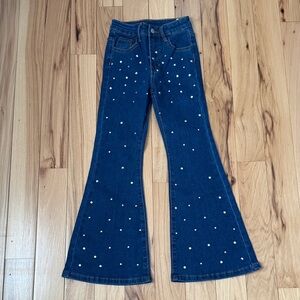 SHEIN Dark Blue bell bottom jeans with rhinestone detail on front.